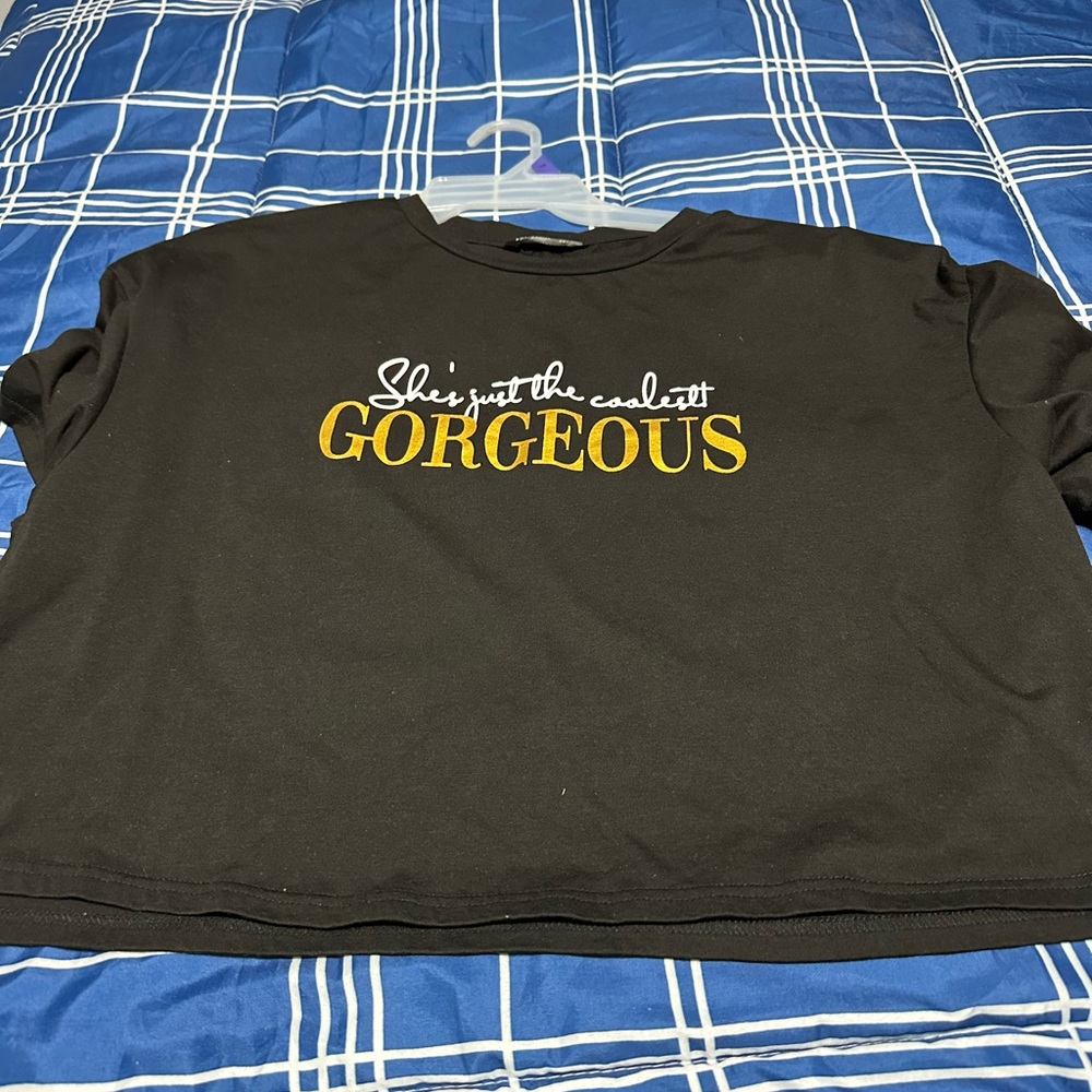 Half top shirts in perfect condition asking for $10 for both